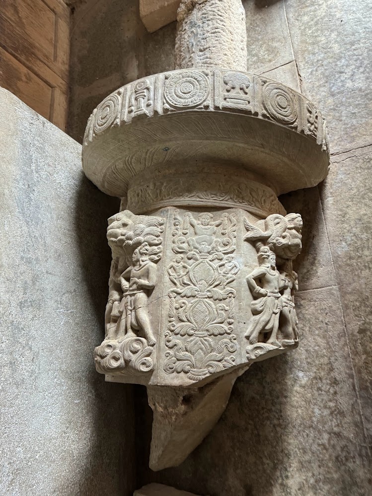 \

Here's a fragment of a yashti pillar symbolizing the cosmic axis and originally placed atop the stupa.