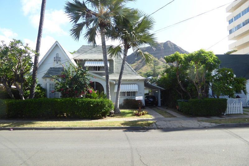 Not impressed? You want a house with character? How about this: wedged between Diamond Head and the sea on Kalalaua Avenue?