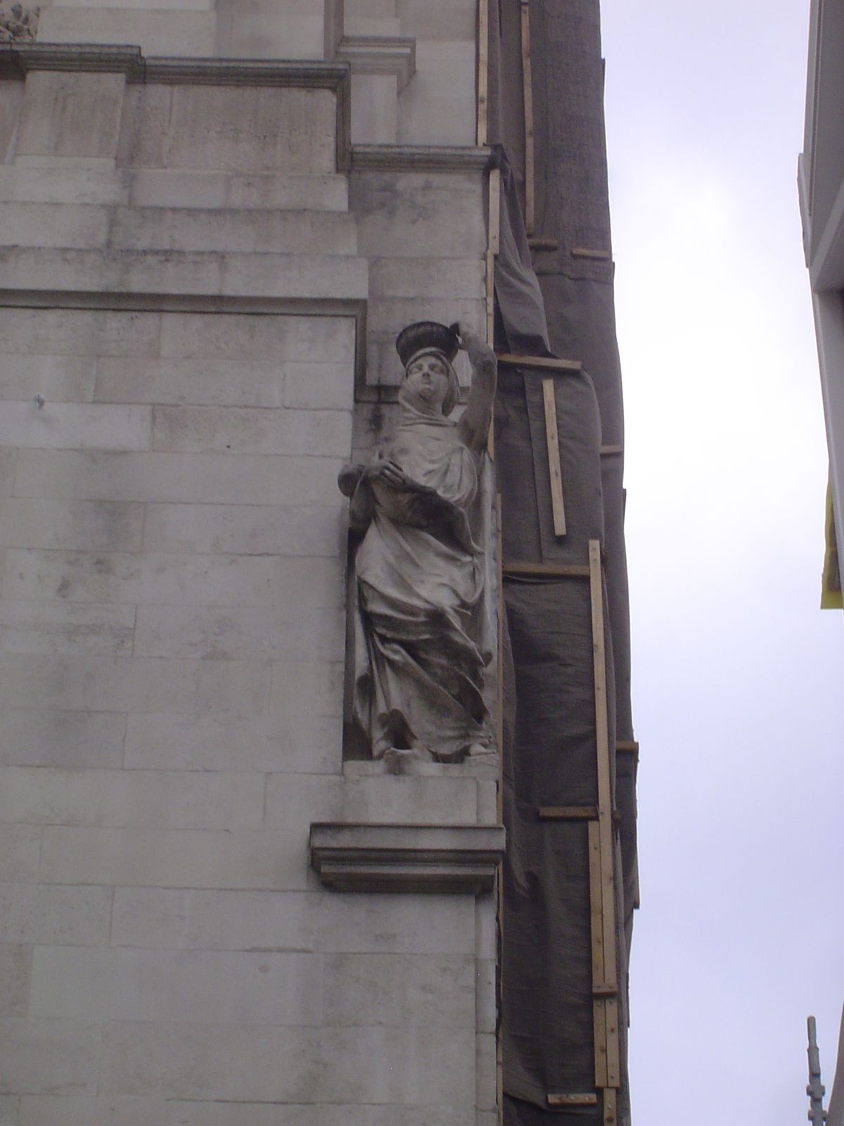 Wood also did this figure of a woman carrying a baby.