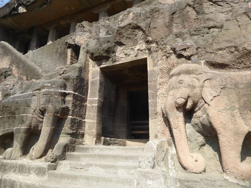Here's Cave 16 above its grand entrance. The elephants have lost their tusks. The cave is often described as the prime minister's cave, a re
