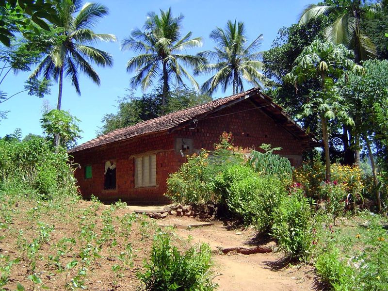 Many village houses are isolated like this one, rather than clustered.