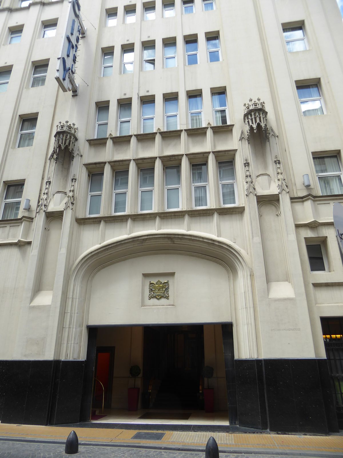 The confusion extends to a cunning blend of Art Deco and Neo-Gothic. The entrance suggests a blade ready to drop.