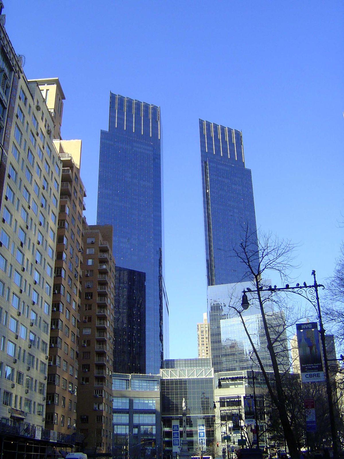 The facades on this side are angled to front on the diagonal alignment of Broadway.