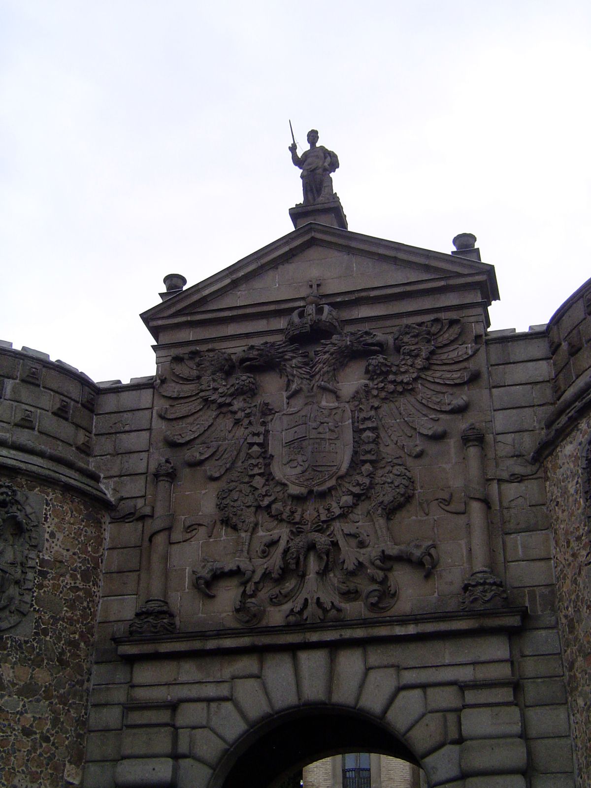 Covarrubias worked for Philip II, who added this eagle and shield in honor of his father, the Emperor Charles V.