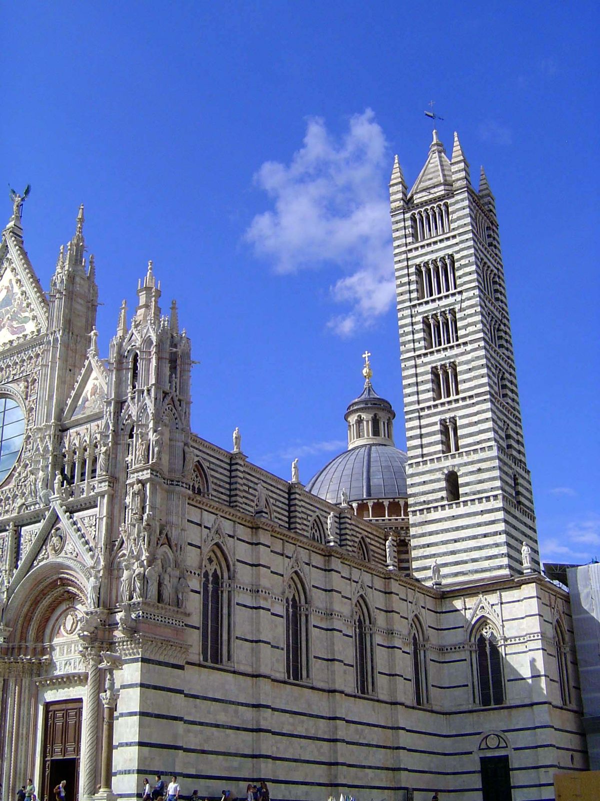 The cathedral has a partly Gothic facade and a wholly Romanesque tower.