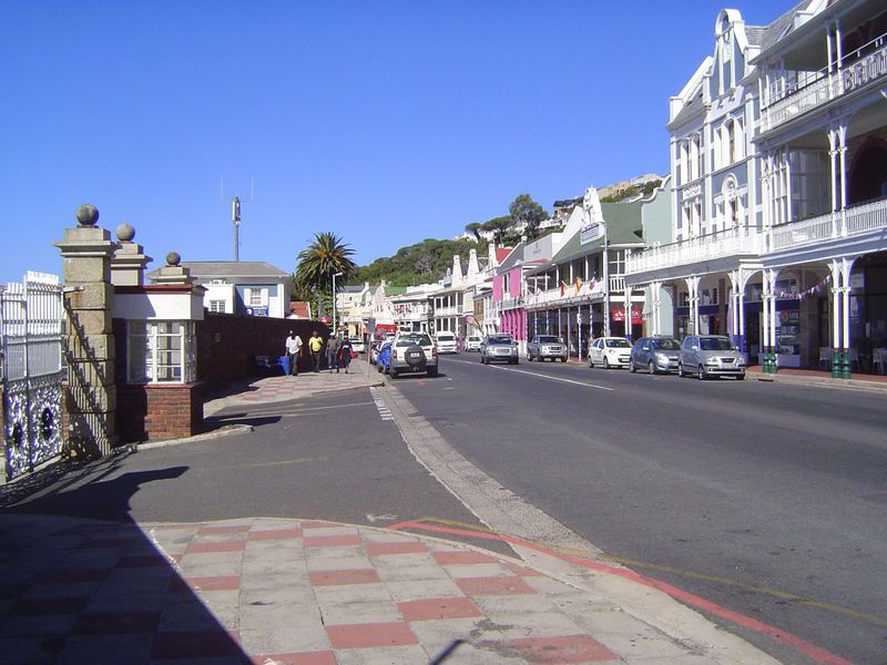 The main street winds along the water's edge, with much of the water's edge occupied by the naval base.