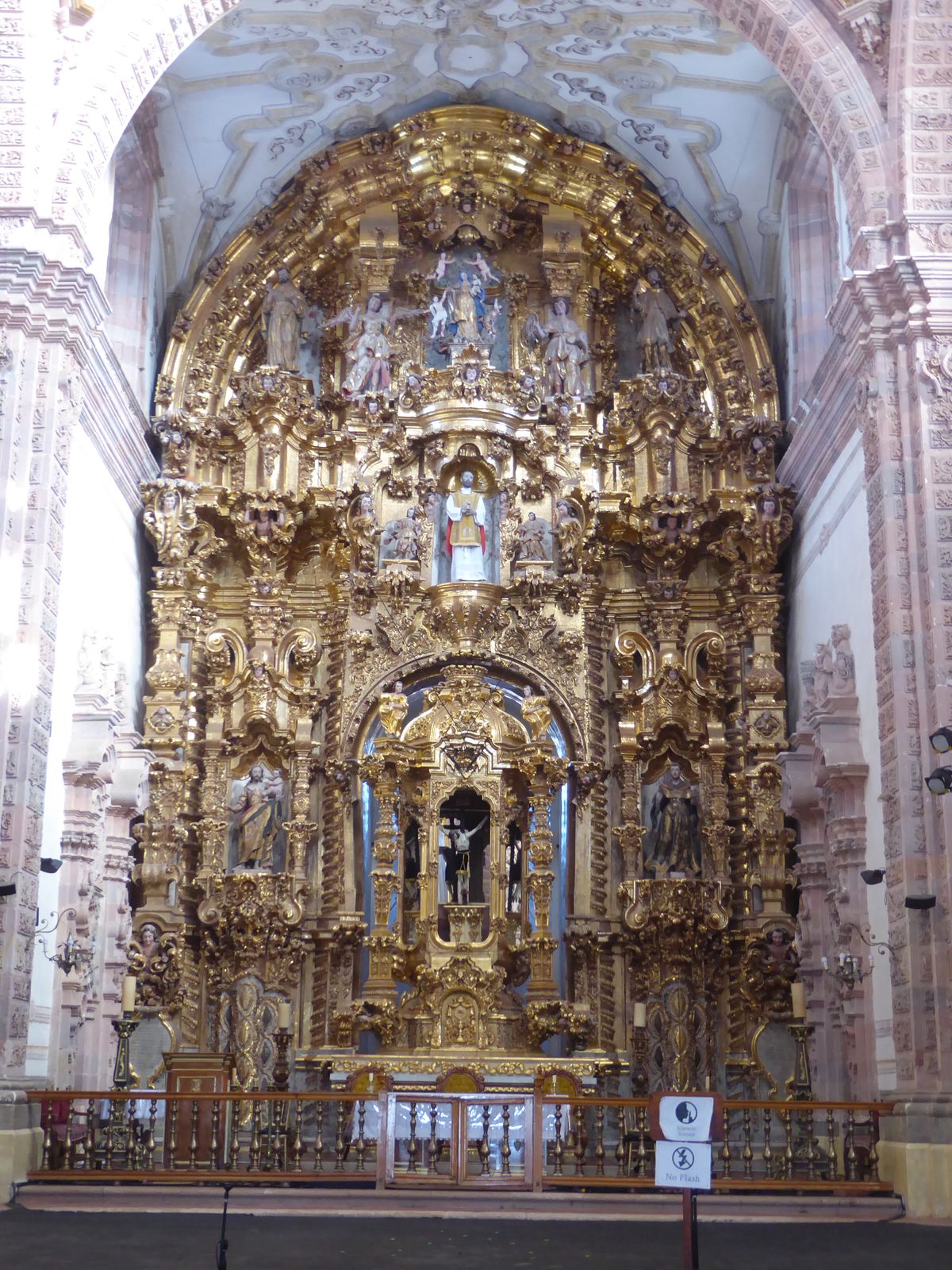 Gold is thick on three altarpieces. This one is front and center.