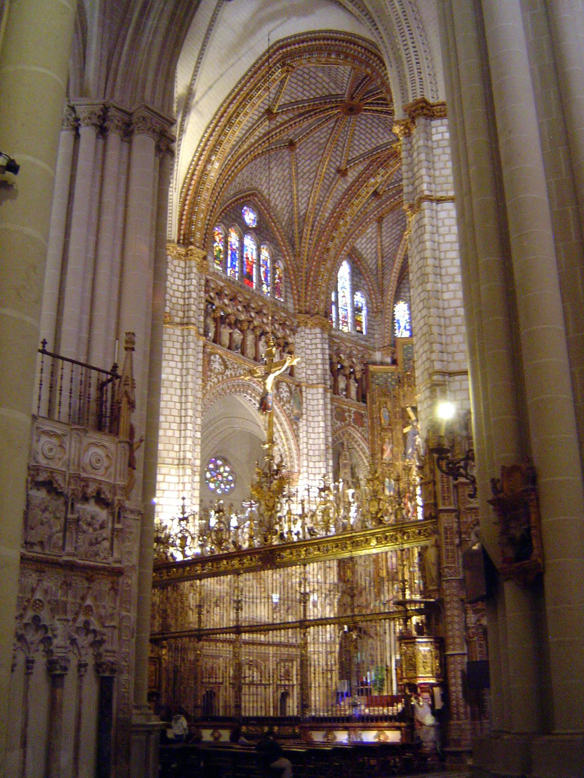 A view from an aisle of the reja or screen before the main altar.
