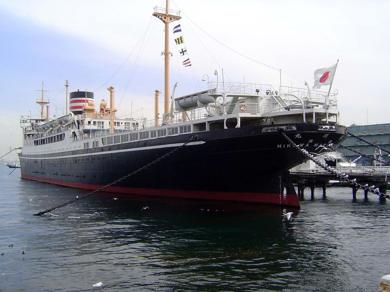 Parked alongside the frontage is the retired Hikawa Maru. Its maiden voyage was from Kobe to Seattle in 1930, and it made over 250 Pacific c