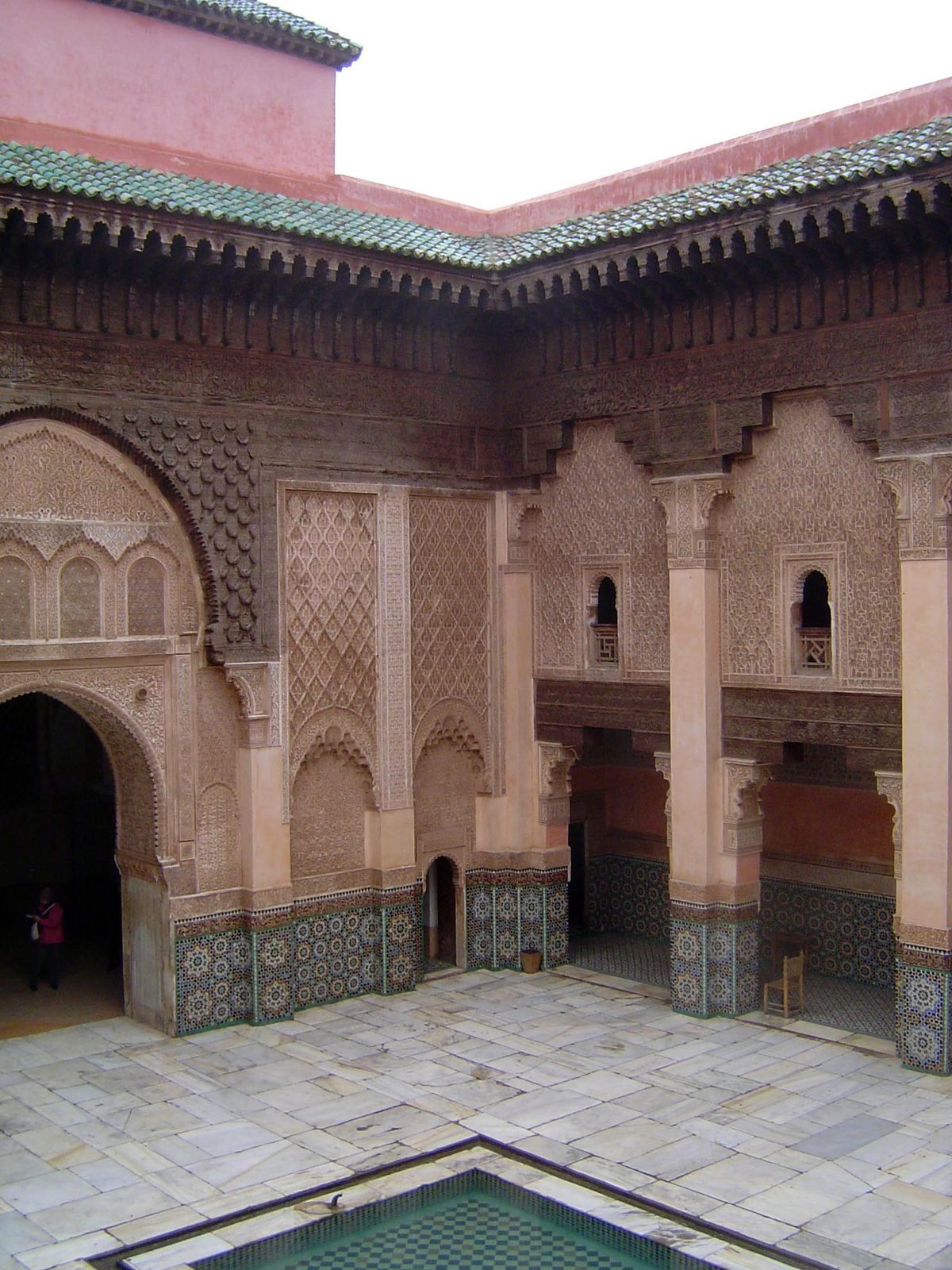 Garmoud tile above, with zillij on the lower walls.