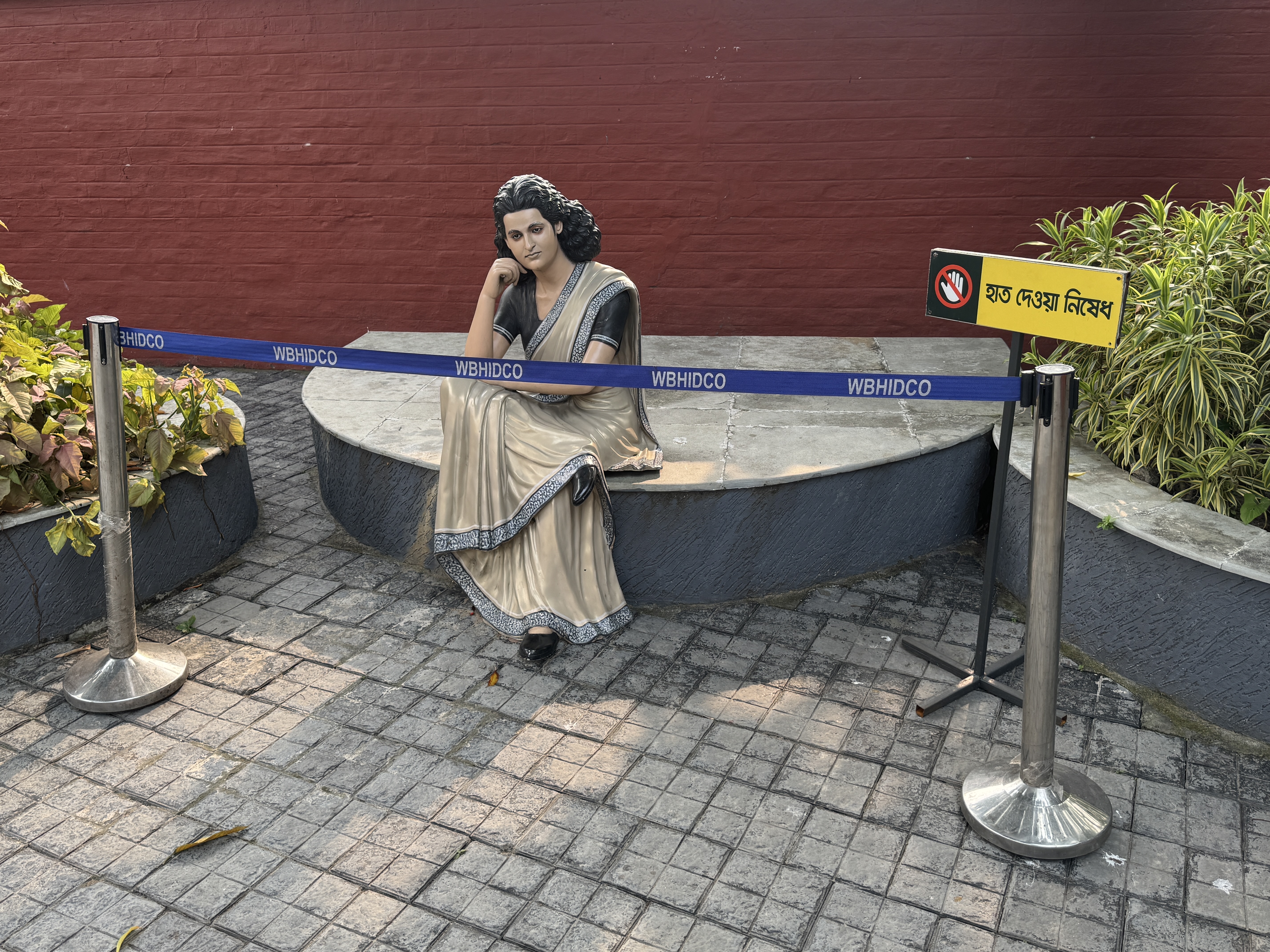 Quick double take.  Yes, it's a young Indira Gandhi waiting for one of her fortnightly meetings with her imprisoned father, Jawaharlal Nehru