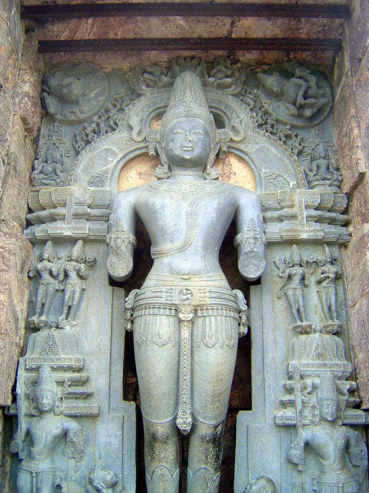 It's Surya, a form of Vishnu; flanking his knees and only barely seen in this image are two adoring dawn maidens.