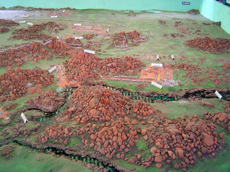 A relief model in the museum at Kamalapura shows the walled city in the distance and two major temple complexes between it and the Tungabhad
