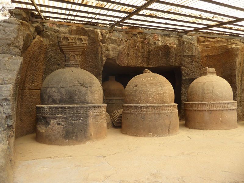 Here's one cave with a set of dagobas marking the tombs of monks.