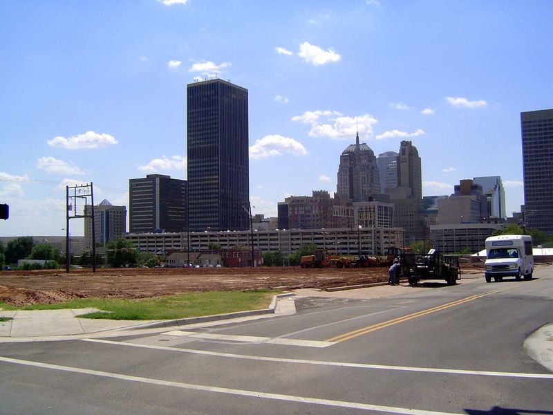This site, once presumably houses, was used as a parking lot by Kerr-McGee after 1972. In 2006 the land was sold to the Triangle Development