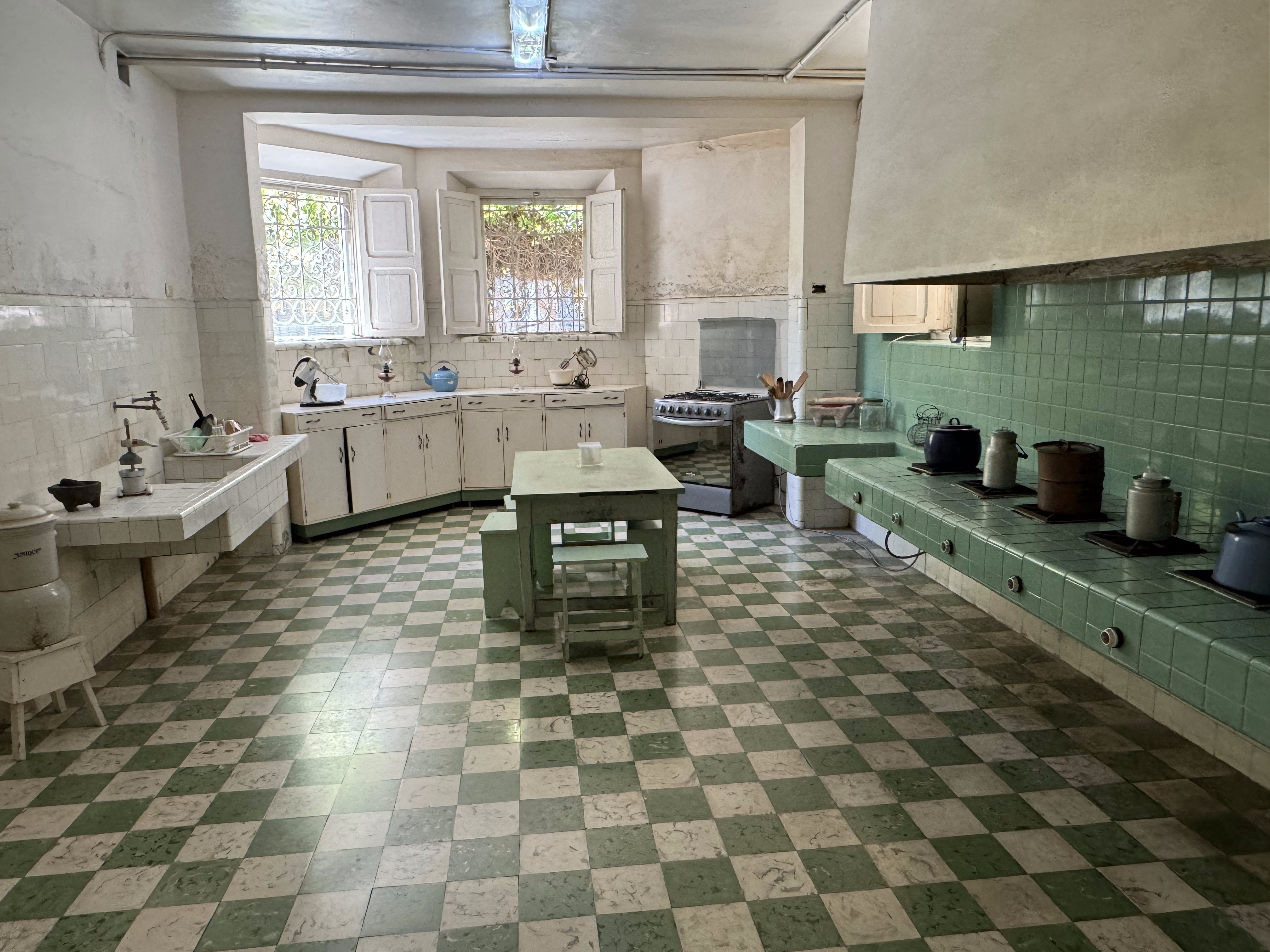 The basement was for servants.  Here's the kitchen, now with two generations of stoves.