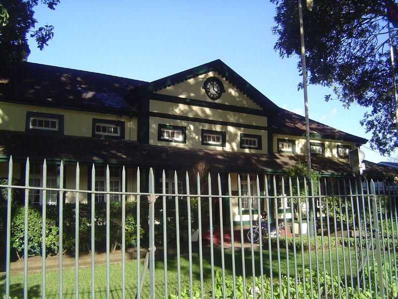 The nearby headquarters of Imperial Tobacco, now secured by a heavy fence.