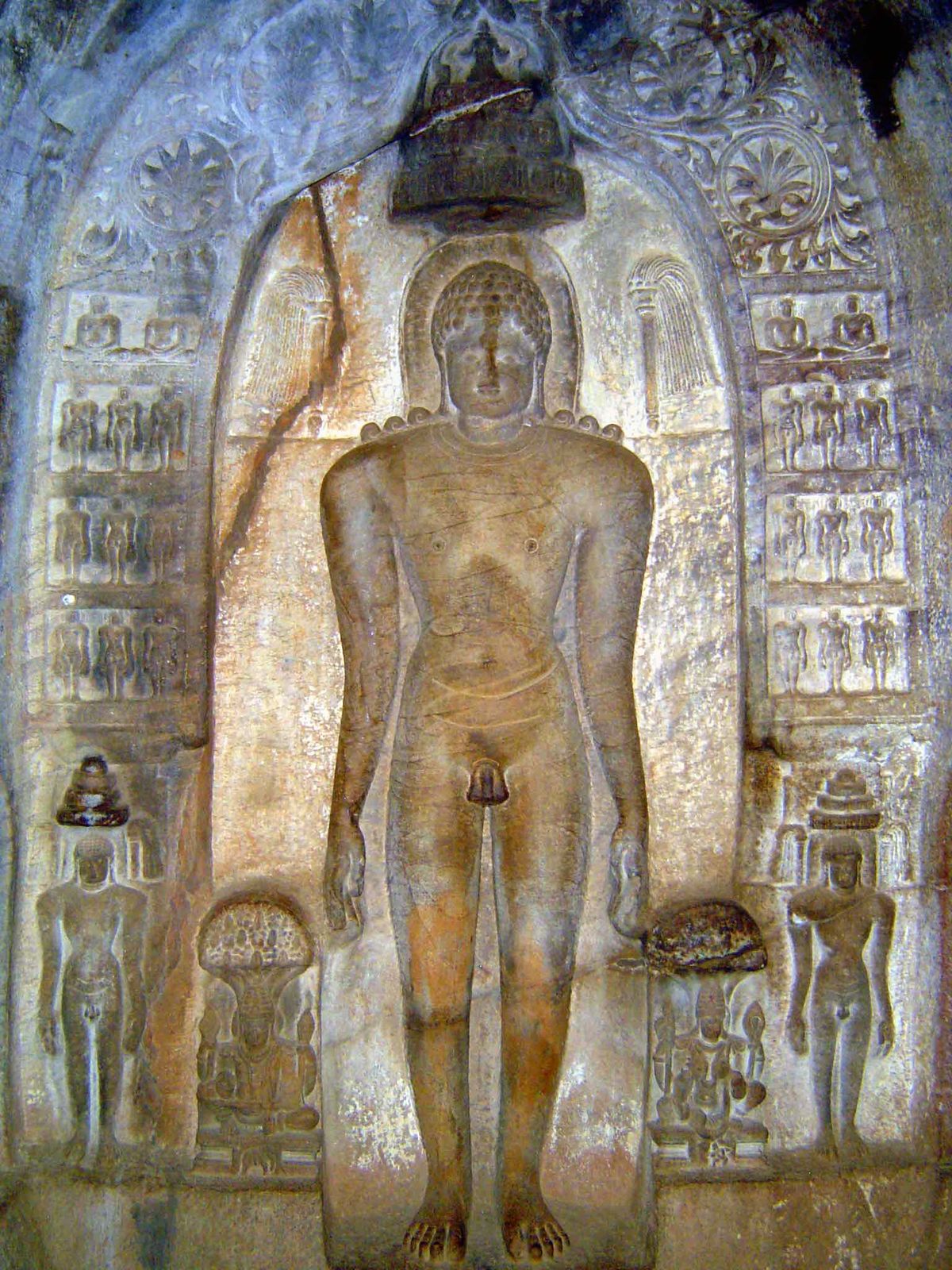 Mahavir, last of the 24 Tirthankaras, stands outside the sanctum. Spirit is what counts, not appearance. Hence his nakedness.