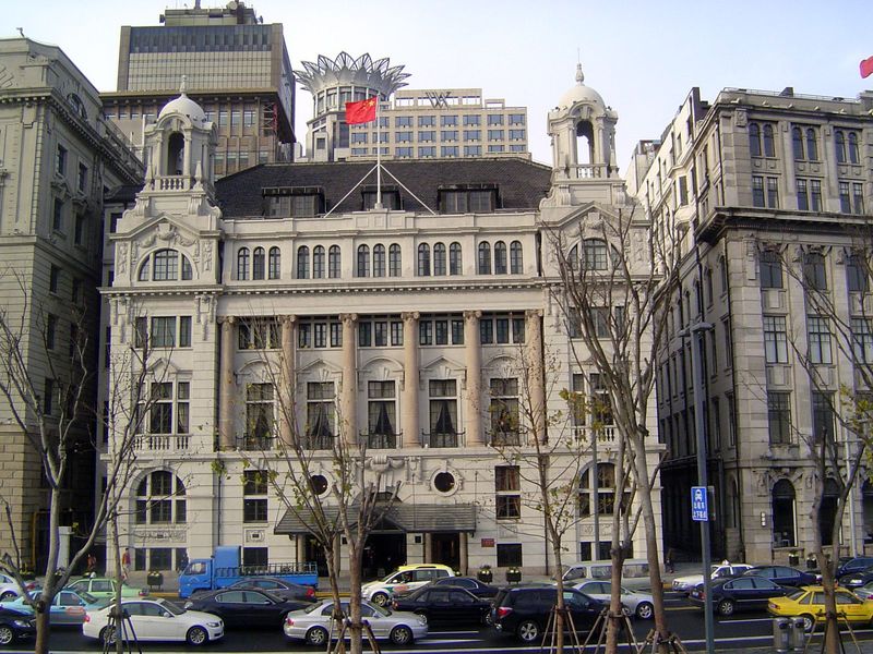 Here's the same building from the Bund. Pelham Warren, then the British consul, opened the club in 1911. Today it's a fancy hotel, with a Fr