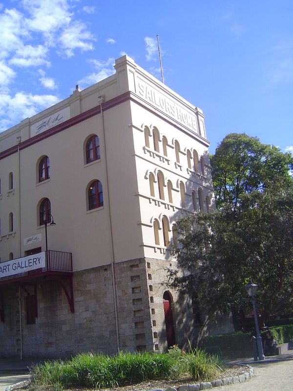 Next door is an art gallery built as a home for merchant seamen. In 1979 the Sydney Cove Redevelopment Authority "resumed" the property appa