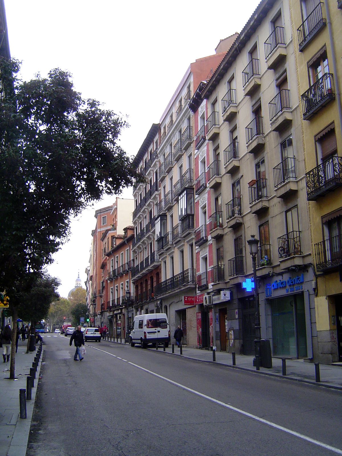 A typical stretch of the Calle Mayor, with the Almudena cathedral dome in the distance.