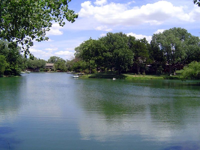 In the northeast quarter, just upstream from the golf course, a dam created this lake.