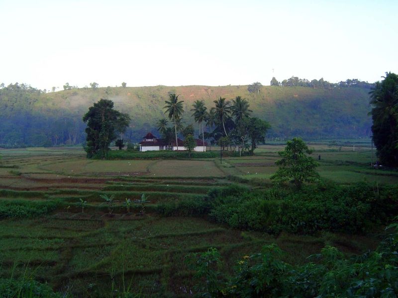A few miles downstream, along the Mahaweli. A temple sits on the floodplain—the river running at the foot of the ridge.