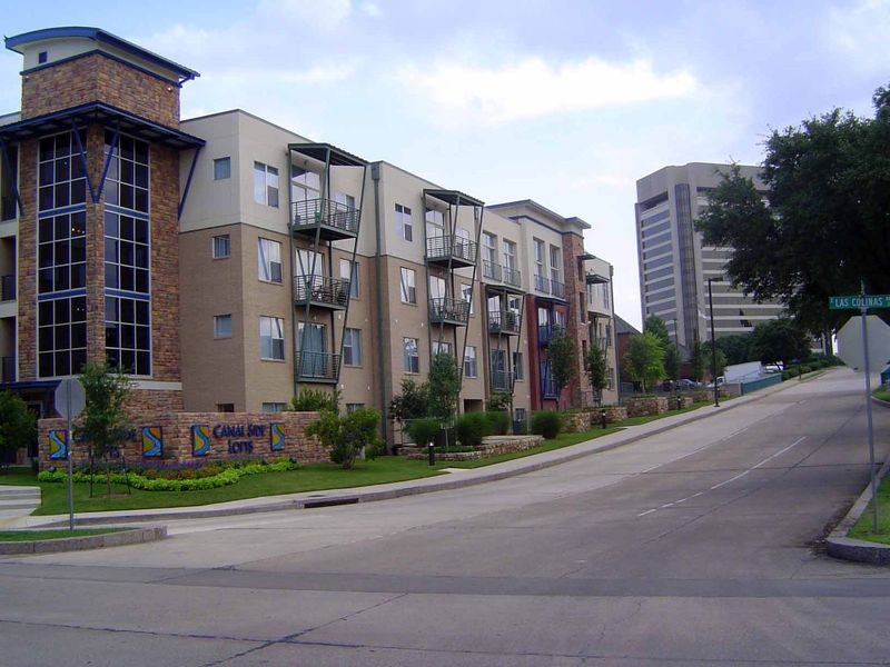 The canal runs behind this apartment building, hence the name Canal Side Lofts. Office buildings bulk up in the rear.