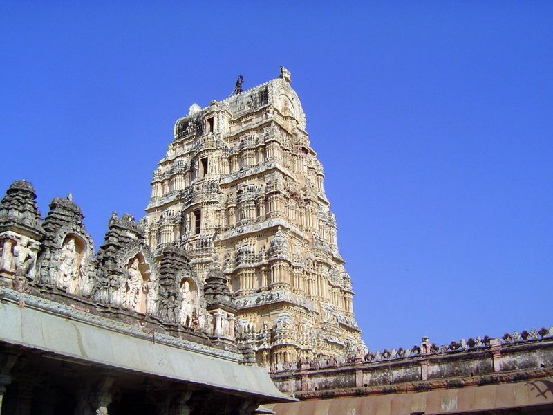 The north gopura, repaired by order of F.W. Robertson, Collector of the Bellary District in 1837, has miniaturized pilasters in each bay ins