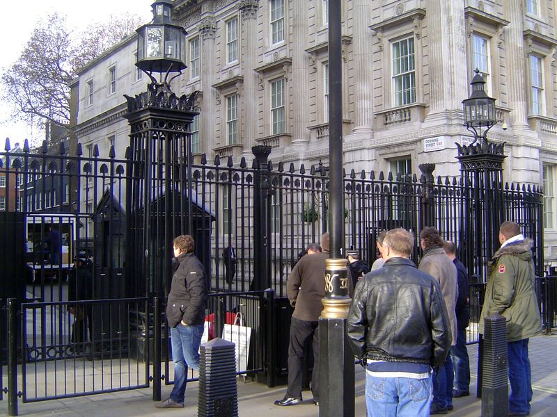Downing Street runs between the Cabinet Offices, here on the right, and the FCO building, twenty steps to the left. Here, Nos. 10 and 11 hav