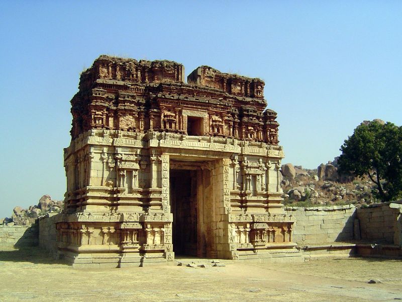 They've gone, vanished like the will-o'-the-wisp. This gopura lacks its pyramid, but the base, as ever, is comprised of symmetrical halves s