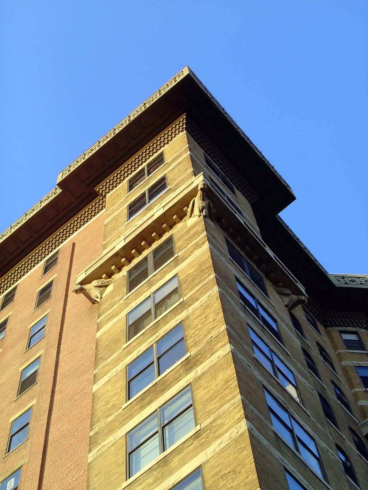 The SW corner again, with gargoyles supporting the lower cornice.