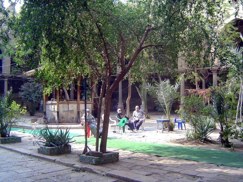 Relaxing in the courtyard. The fountain was transferred here in 1900 from the madrasa of Sultan Hasan.