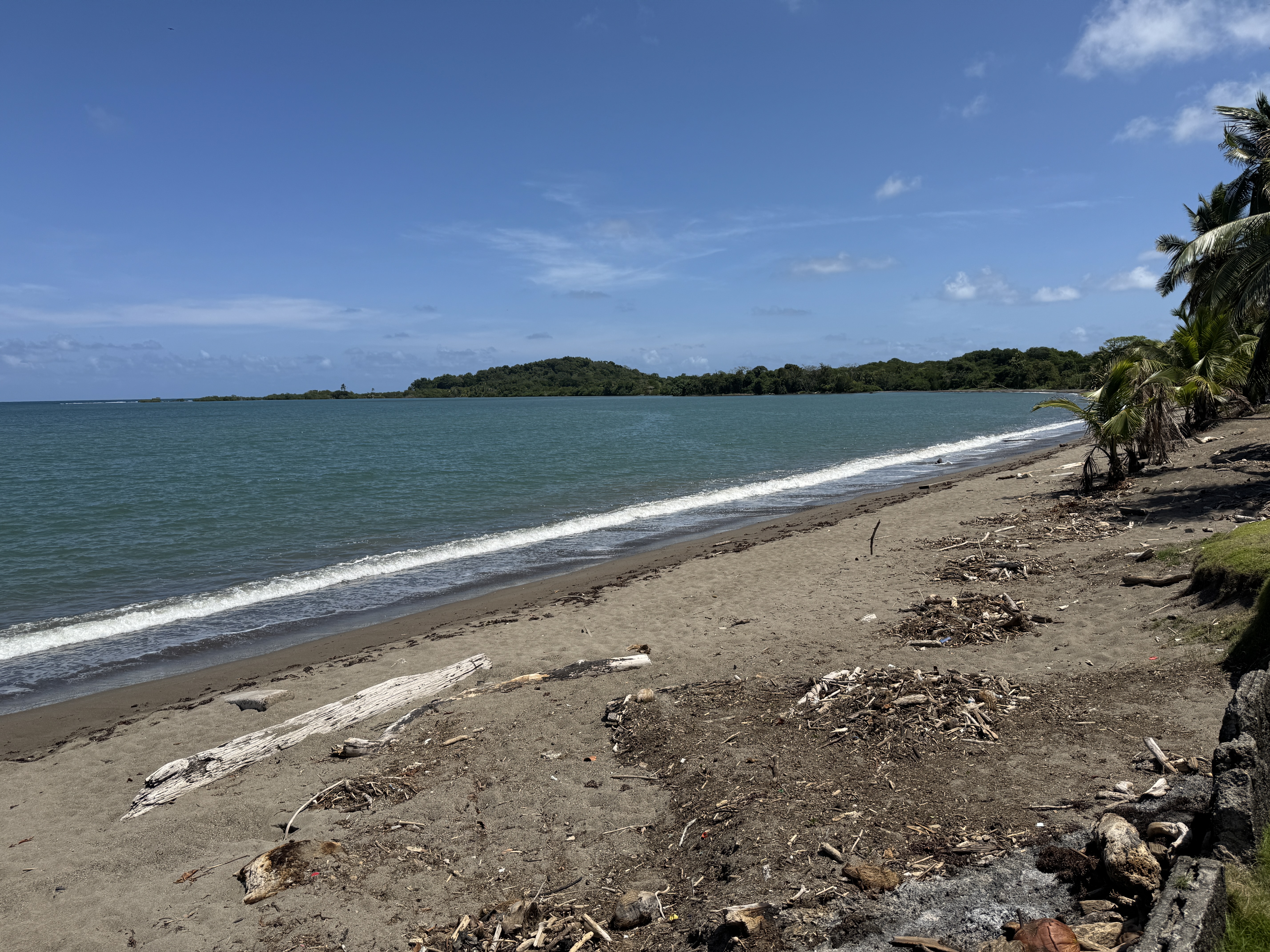 Same spot, looking south instead of north.  There are no hotels, but if there were, they'd have tractors cleaning the sand.  Americans build