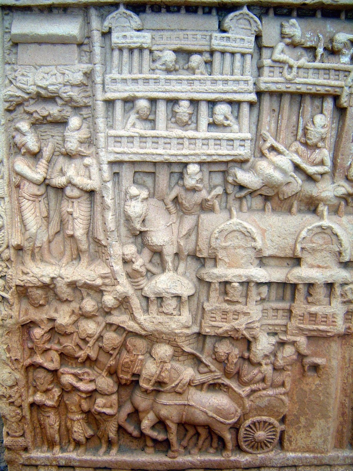 This panel is immediately below the preceding picture. The Buddha has brought new disciples to Magadha, the town shown at the top. King Bamb