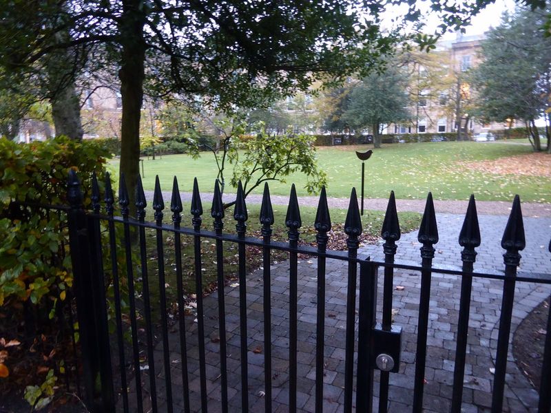 Yes, there's a park. Thank goodness it's locked to keep out the riffraff.