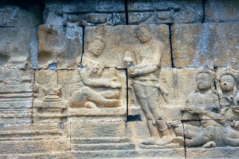Still in the Heaven of Contentment, the Gautama Buddha gives his crown to Maitreya, a bodhisattva whom he has chosen as the next Buddha.