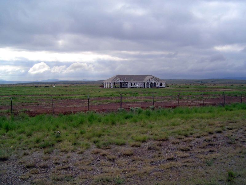 On the road north of Alpine, a house under construction.