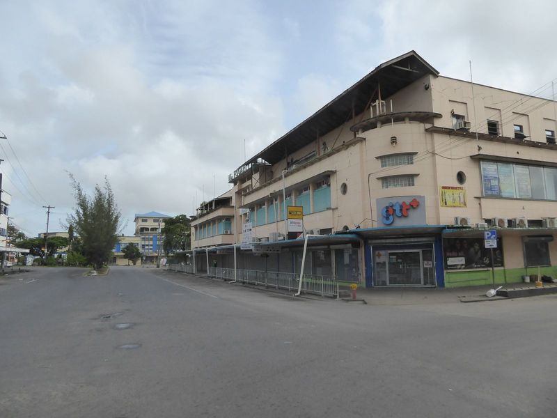 The Fogarty store early Sunday morning. The building now houses a collection of tiny shops. The initials over the door signify Guyana Teleph
