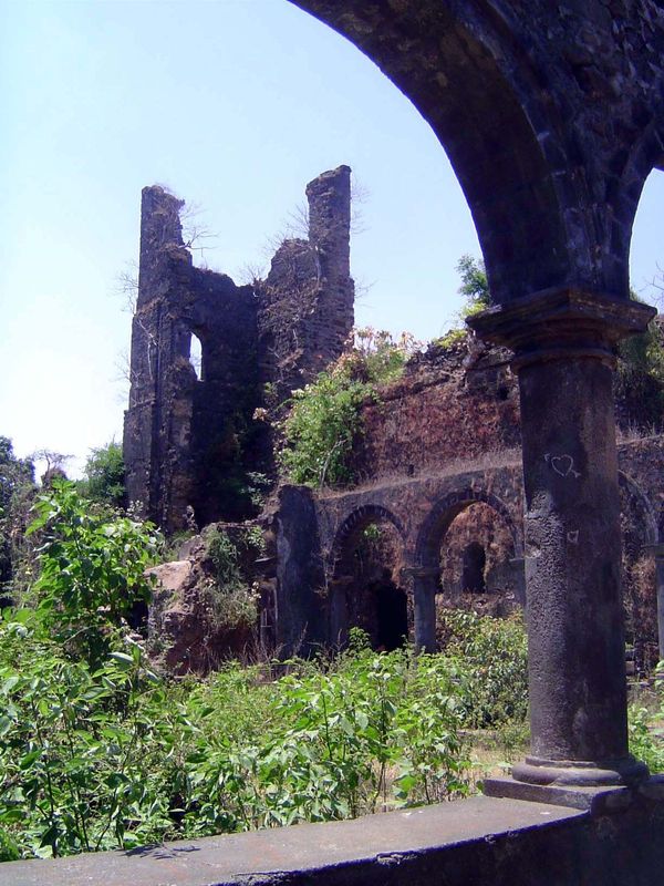 The overgrown cloister of the Franciscan church and monastery of St. Anthony. The church was built by Antonio do Porto, a missionary, at the