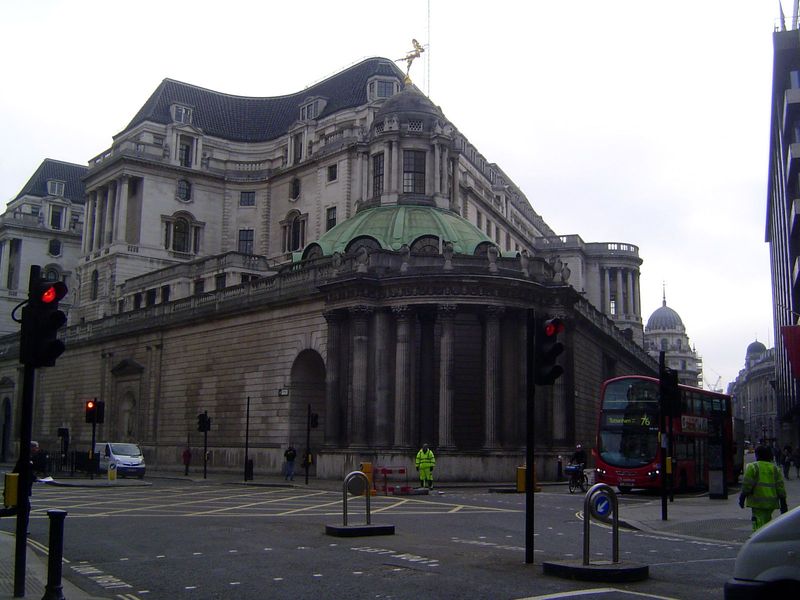 We've jumped to the Bank of England, safe behind John Soane's perimeter wall, a "grooved cliff of Portland stone" 1: 275. In the 1920s and 3