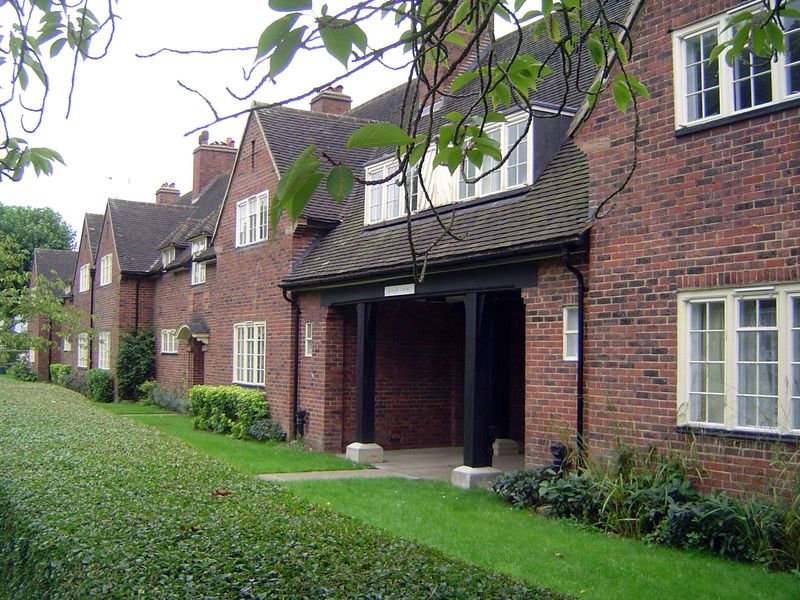 Behind Arcade House, Queen's Court offers terrace housing built about 1927.
