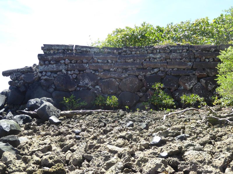 Here's the enclosure wall on Kerien; the base boulders are honest-to-God megaliths, but the coral jumble is a real hazard, unstable and wick