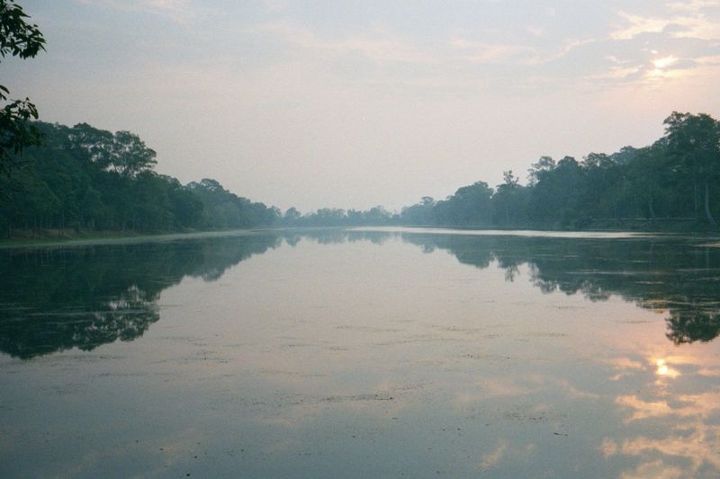 Hindu or Buddhist, Angkor Wat is in the shape of a near-square rectangle enclosing about 500 acres and surrounded by a moat. Both in Hindu a