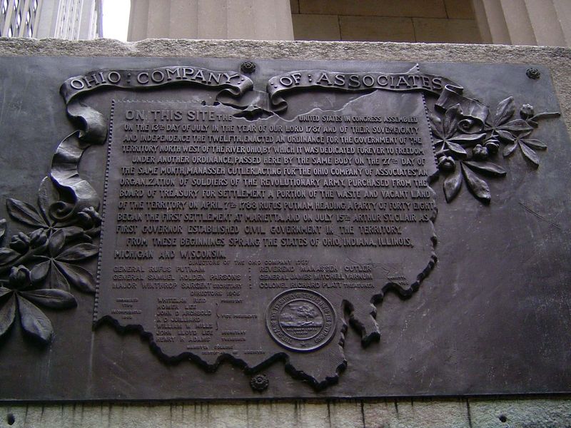 Bolted to the building is this reminder that the settling of the Midwest began with decisions taken here.