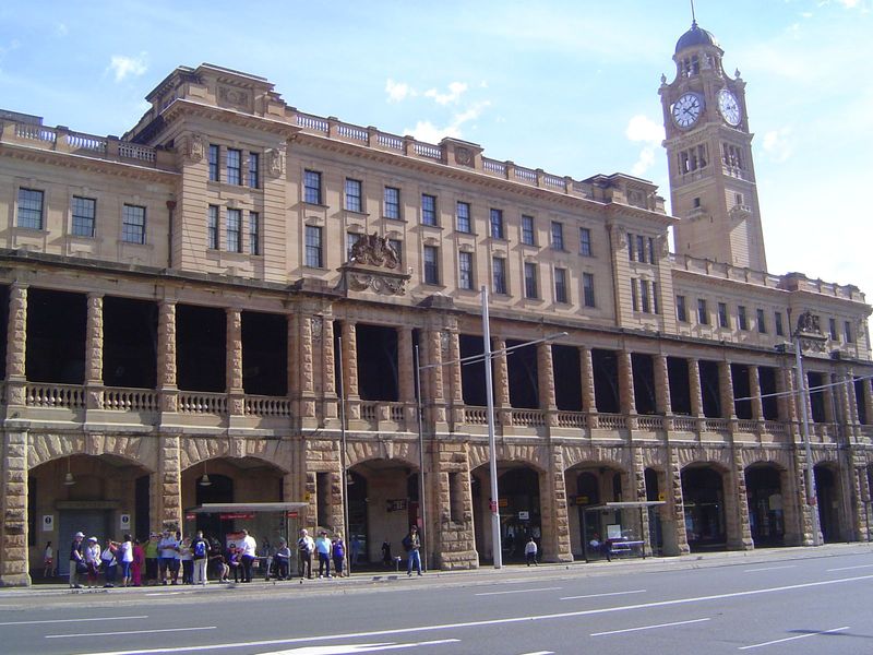 Strange, no? An austere neoclassical building atop some heavily rusticated lower floors, with darkness on the upper level. You still don't h