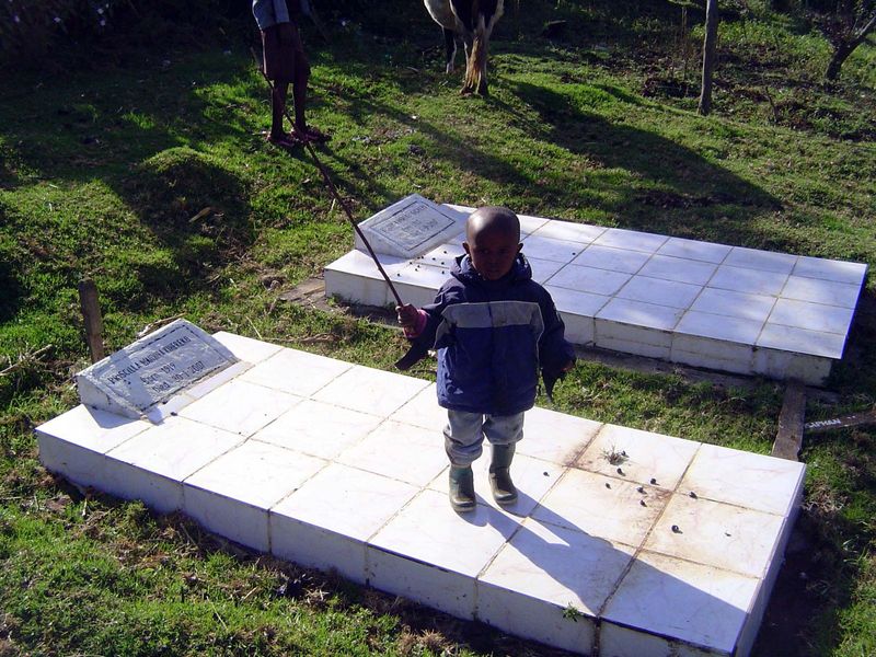 The father is buried on site, as his children plan to be.