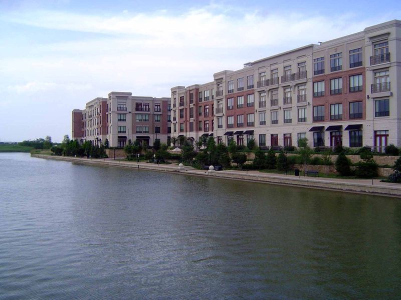 Water plays a big role in many of these developments, but here—the Delano Apartments at Las Colinas—the water is too big to be very welcomin