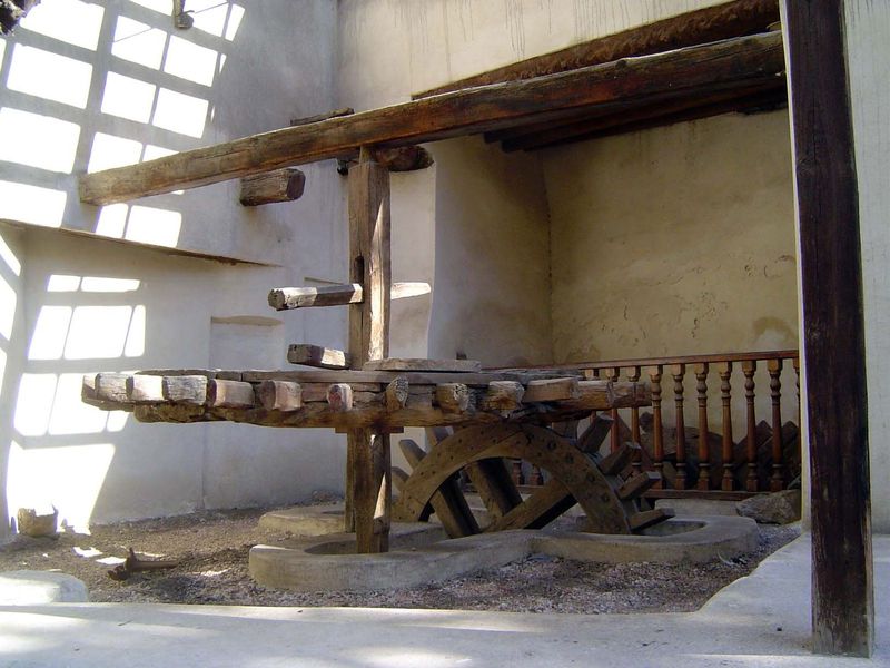 Out back, a waterwheel.