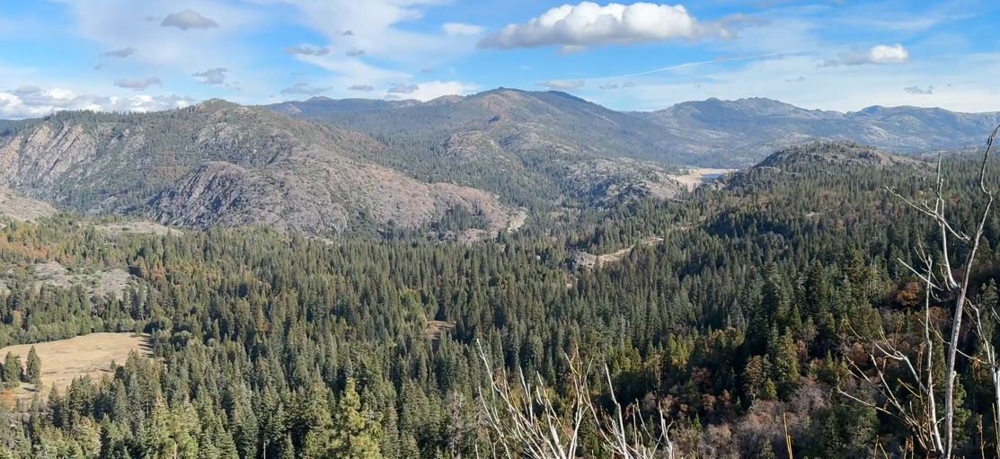 I'm about 30 miles west of Truckee and stopped at a vista point looking over Emigrant Gap, a route used by pioneers.  But let me turn around